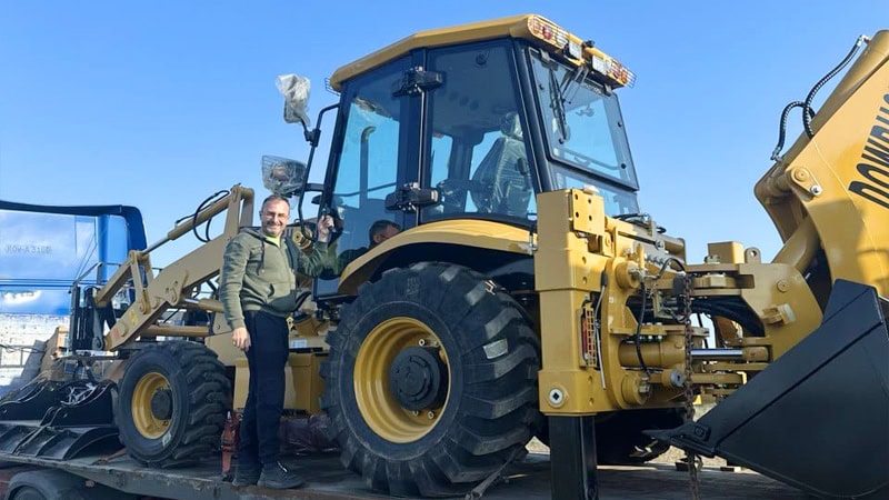 Photos taken by the customer after receiving the backhoe.